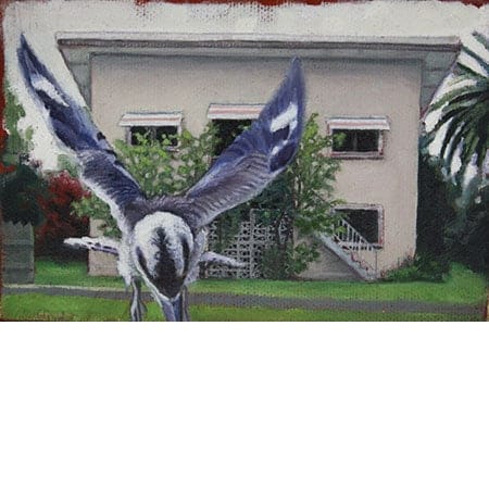 a bird flies away from a house