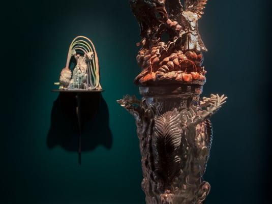 sculpture with flying creatures