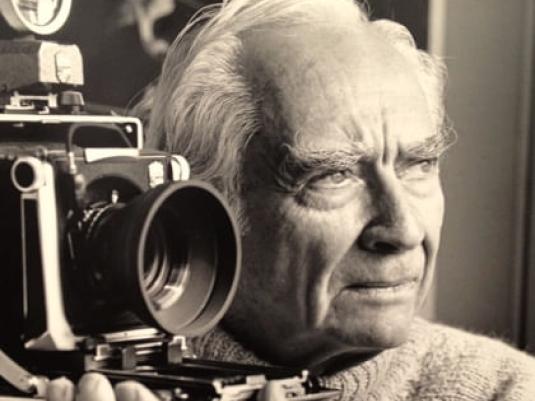 Photo of Max Dupain with his camera