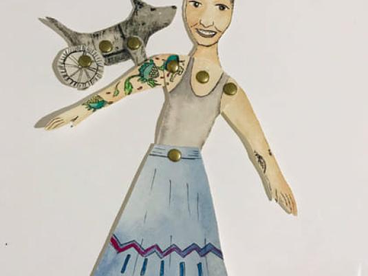paper doll of woman with a dog with a wheel for back legs on her arm