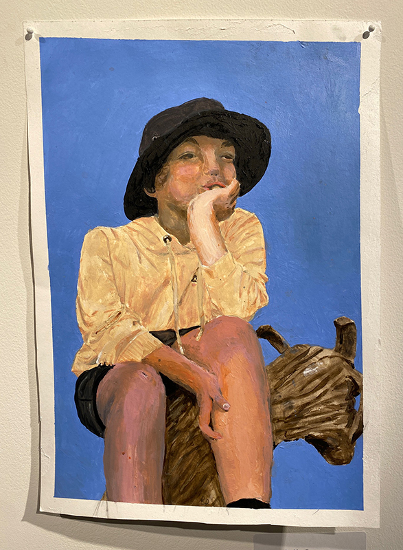 A portrait of a young non-binary person