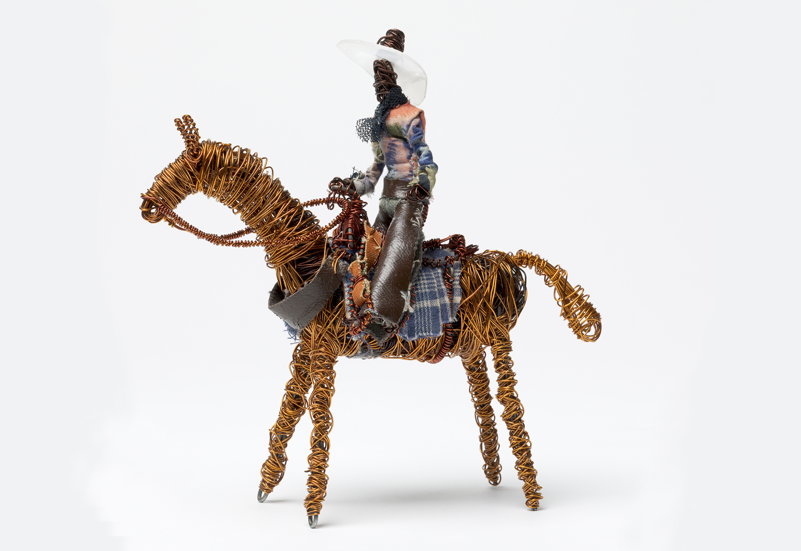 sculpture of stockman on a horse
