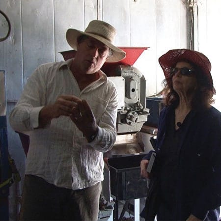 two people standing in studio