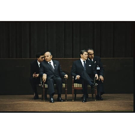 U.S. President Ronald Reagan and Soviet Premier Mikhail Gorbachev with translators