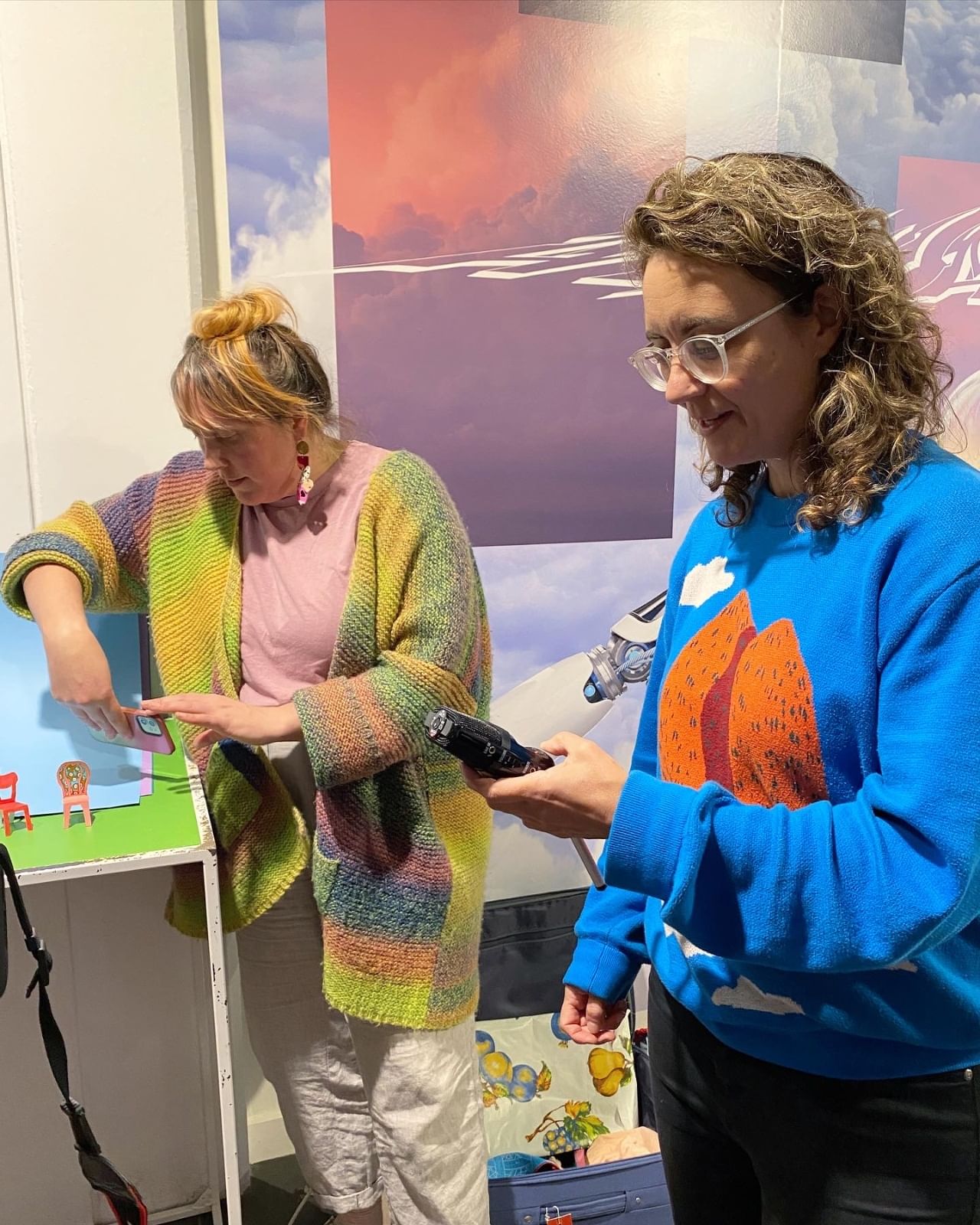 women working on artwork