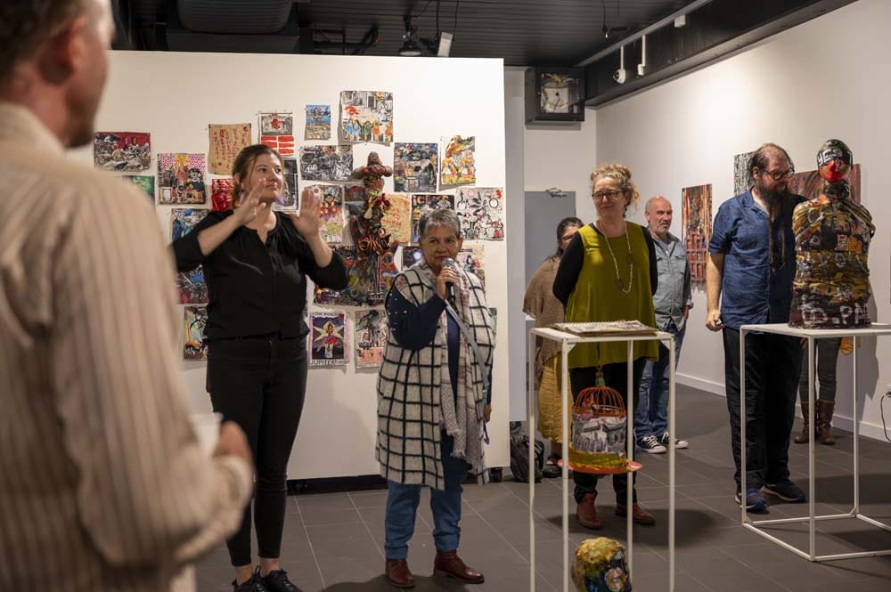 people at exhibition opening 