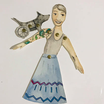 paper doll of woman with a dog with a wheel for back legs on her arm