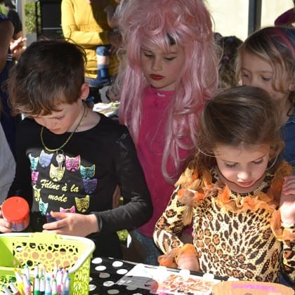 group of children making artwork