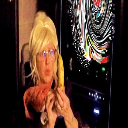 Peggy Popart with banana next image of a swirling portal 