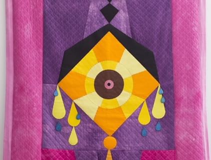 patchwork panel with purple and pink background and orange and yellow diamond 