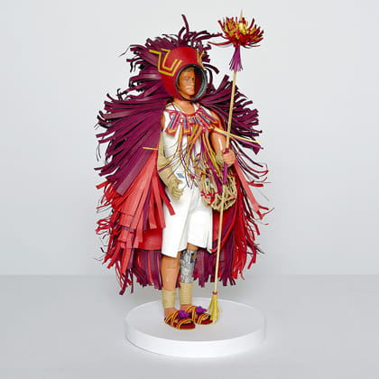 child's action figure in outfit created by Benja Harney
