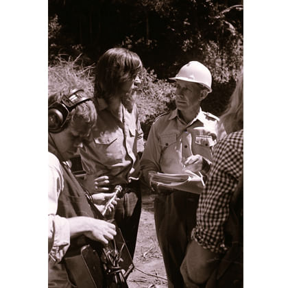 David Kemp and Alex Floyd talking in front of journalists with the forest behind them 