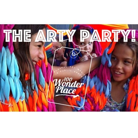 poster for arty party with children smiling in colourful blankets
