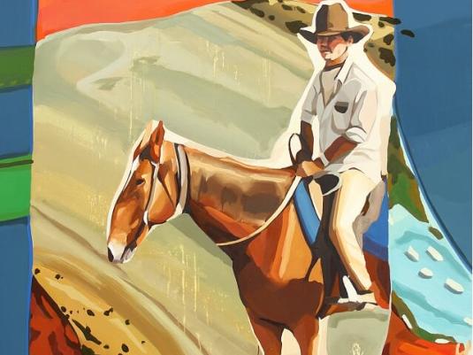 stockman on horse in landscape