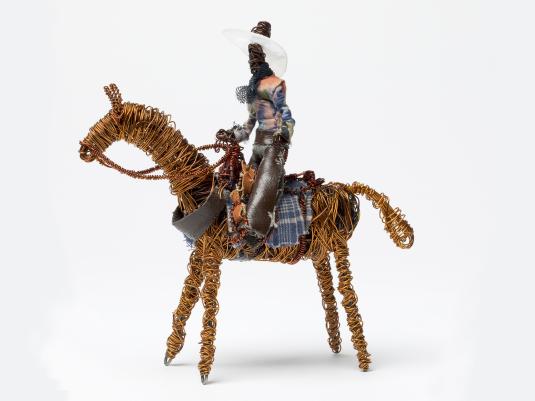 sculpture of stockman on a horse