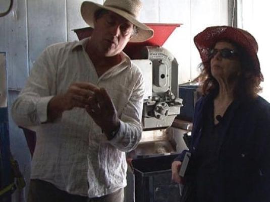 two people standing in studio
