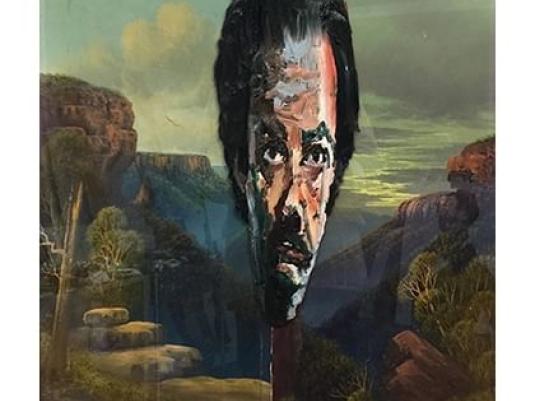 portrait of Noah Taylor painted over framed painting of the Blue Mountains