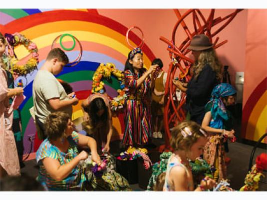 group of people creating objects for the rainbow garden with Hiromi Tango