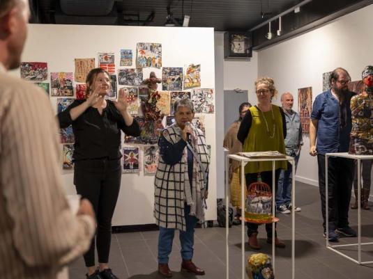 people at exhibition opening