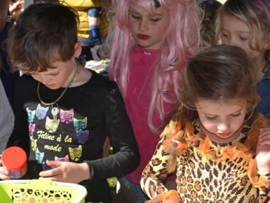 group of children making artwork