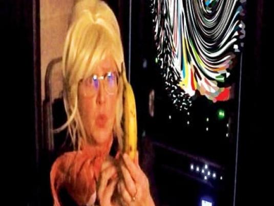 Peggy Popart with banana next image of a swirling portal