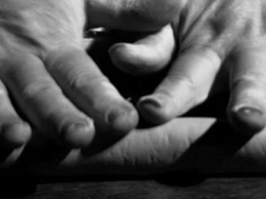 four hands on top of each other