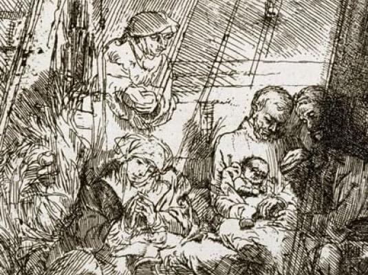 group of people around a baby
