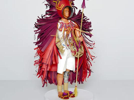 child's action figure in outfit created by Benja Harney