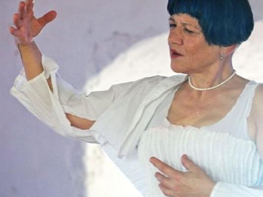 image of artist with one arm raised